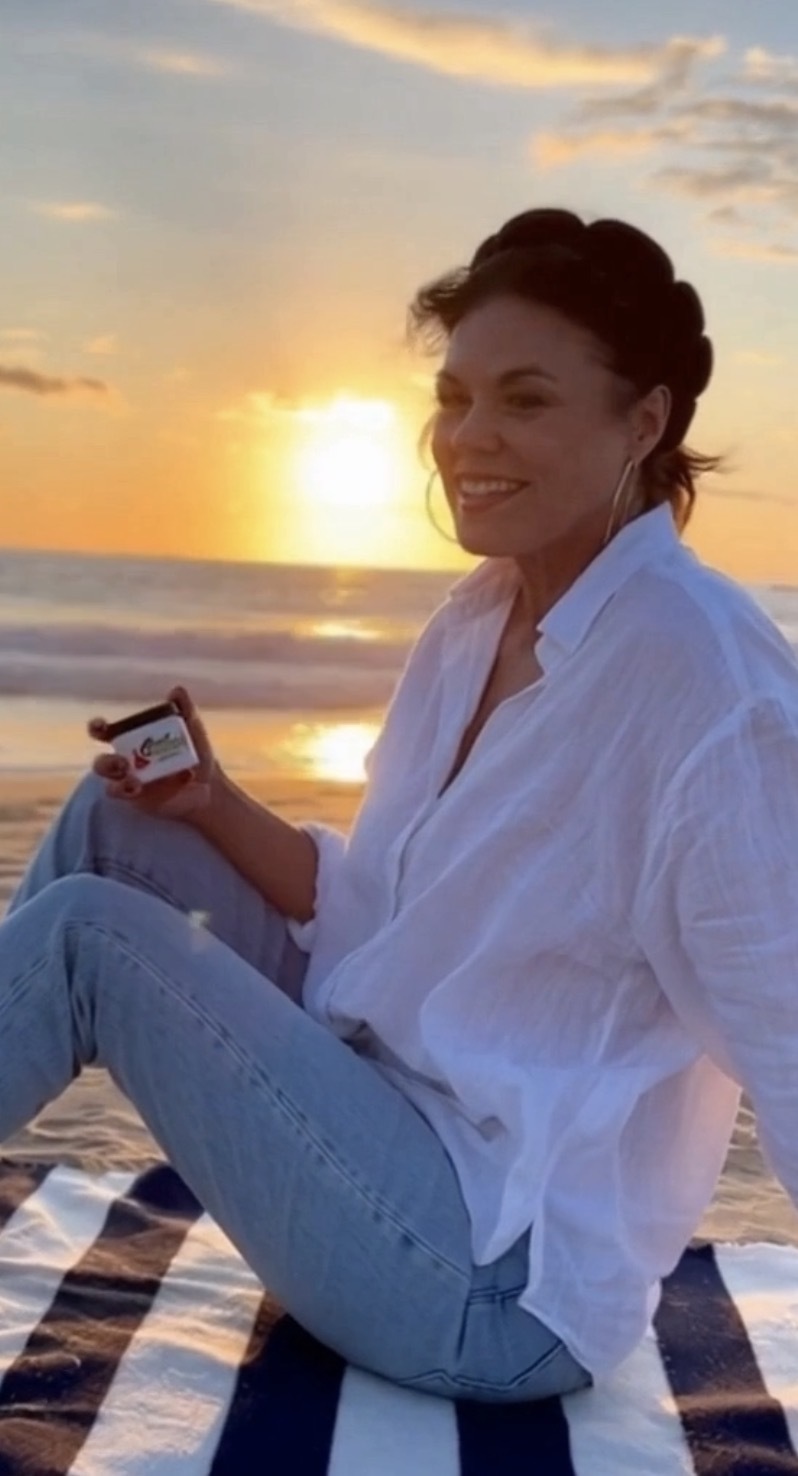 From Judy Judy Reber at the beach holding Crack Blaster Repair Lanolin Balm